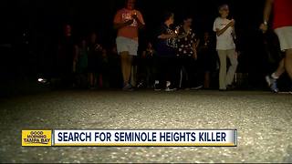 Law enforcement officers search for Seminole Heights killer