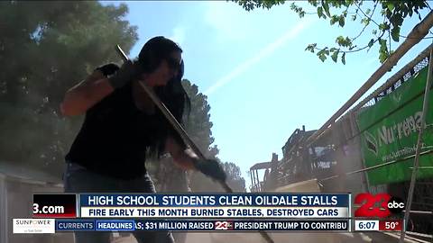 Highland High School FFA students help clean up burned horse stalls in Oildale