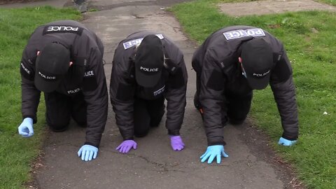 Police On Hands And Knees Searching For Their Credibility