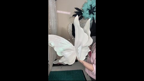 Hand making white and black butterflies 🦋