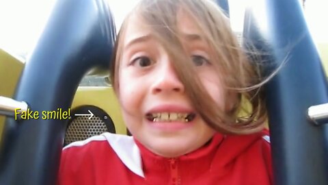 Dad and Daughter On Roller Coaster