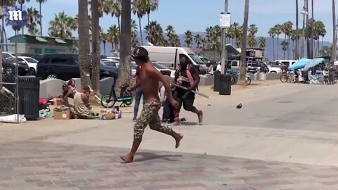 Venice Beach boardwalk two homeless men BRAWL