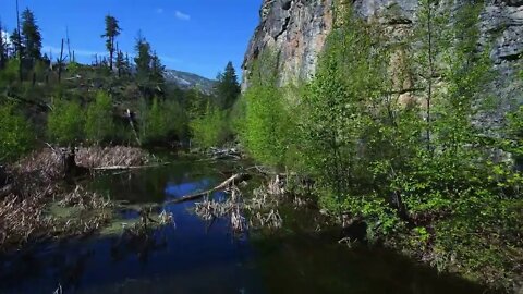 Spring Morning over a Frog Pond at the base of a face of Okanagan Mountain