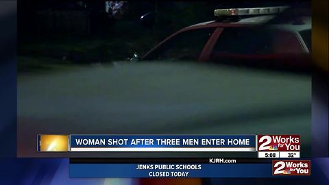 Woman shot after three men enter home