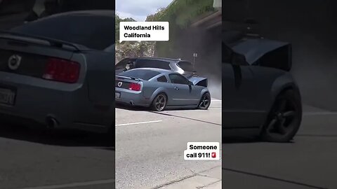 Woodland Hills: Car driving erratically hits other cars while people are recording...