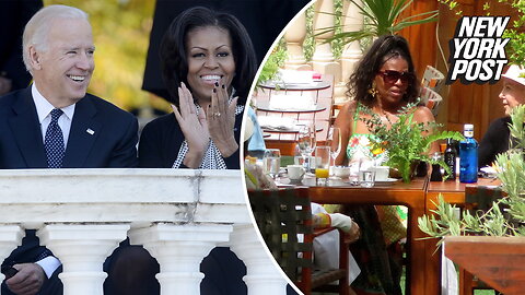 Michelle Obama soaks up sun in Mallorca as chaos consumes Dems at home