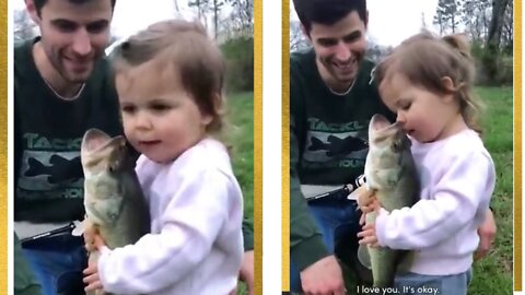 Cuteness overloaded - baby girl was pouring her love for fish