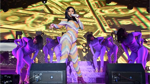 Cardi B Performs In A Bathrobe After Wardrobe Malfunction At Bonnaroo