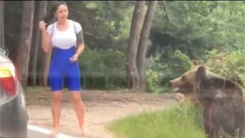 Woman nearly attacked by bear after trying to take photo