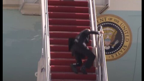 Joe Biden falls entering Air force one!