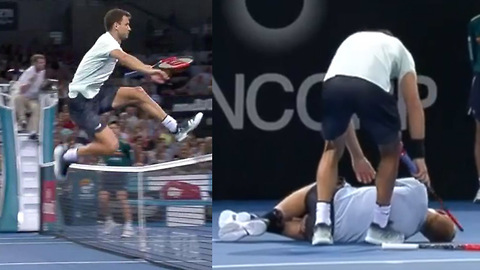 Grigor Dimitrov JUMPS the Net to Help After Opponent Goes Down with Injury