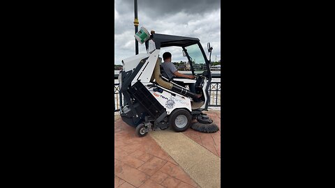 Street vacuum cleaner at Pak Kret in Nonthaburi Province.