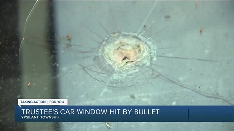 Ypsilanti trustee's car window hit by bullet