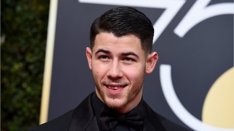 Nick Jonas And John Stamos Have Hilarious Online Feud Going