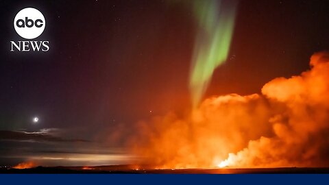 Northern Lights shine as lava spews from erupting volcano in Iceland