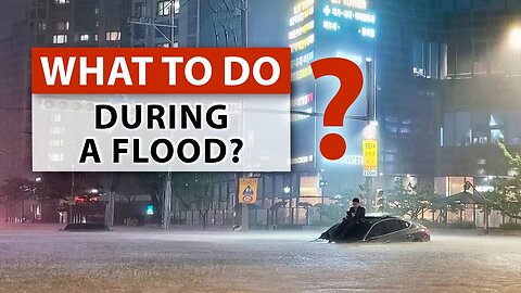 What should you do if you are caught in a flood with your vehicle