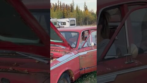 Brooke making engine noises in her 1964 Plymouth valiant. I worry about her!