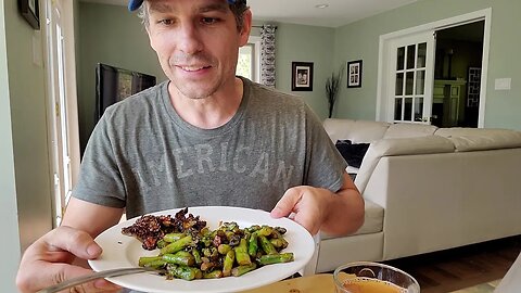 Foraging for lunch in the food forest - morels, asparagus and more.