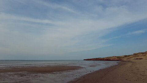 Walking Cavendish Beach towards the Cliffs