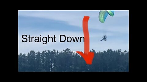 Watch as the paramotor drops 50 ft in cold air sink (down draft) next to a pond