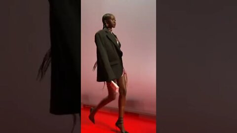 Adut Akech in Versace Fall/Winter 2022 FashionShow Catwalk