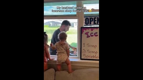 Dad sets up an ice cream shop at the living room window