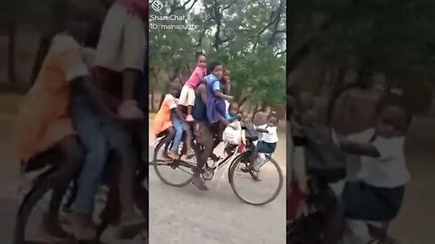 Man Riding Bicycle With Nine Children#viralshorts