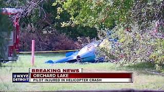 Pilot rescued from being trapped after private helicopter crash in Orchard Lake