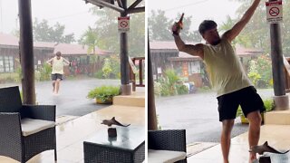 Dude slips & falls on wet tiles with beers in hand