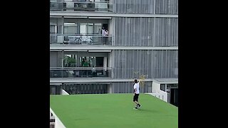 These Spaniards are playing games from their balcony during the quarantine