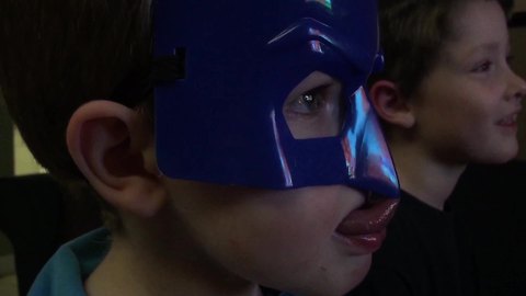 A Little Boy With A Batman Mask Wins At Lick Your Nose Challenge