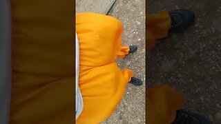 Yellow baggy nylon wind pants