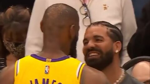 Lebron and Drake embrace after Lakers OT win in Toronto