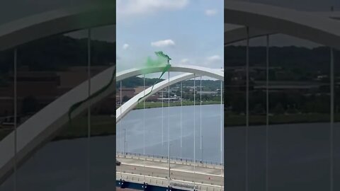 PRO ABORTION PROTESTER ON TOP OF WA DC BRIDGE