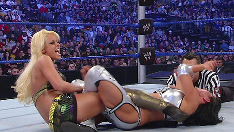 Maryse uses the Figure-Four to make Candice Michelle tap out- Survivor Series 2008 @0vikash