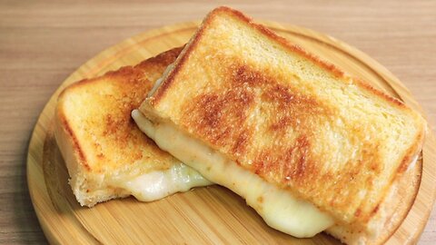 Learn how to make the best-Grilled Cheese sandwich with a crisp, buttery exterior and gooey cheese center.