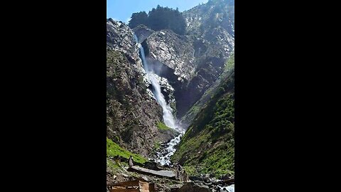 A small river and green grass in district bagh azad kashmir