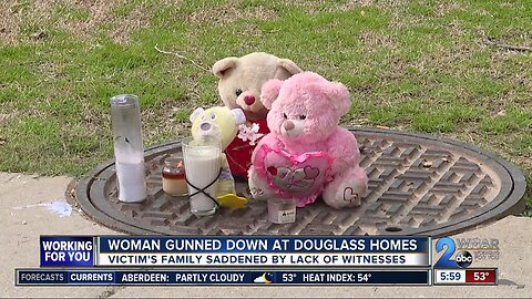 Woman gunned down at Douglass Homes