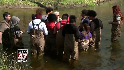 Students release salmon into local creek