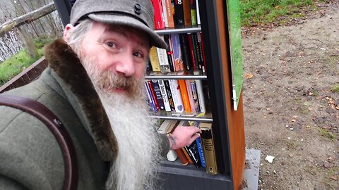 Smallest public Outdoor Library with a view over the Pont and a bench for reading on site