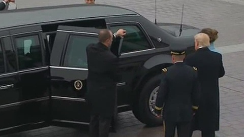 President Trump assists First Lady Melania Trump into limo