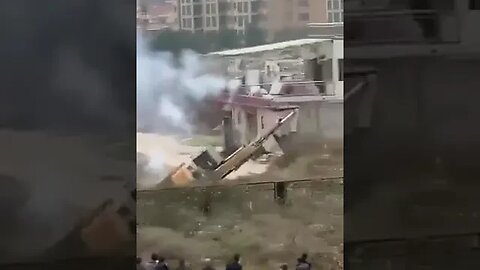 Chinese guy fights excavator with fireworks