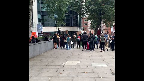 Masked London far-left protesters led by someone with an American accent...