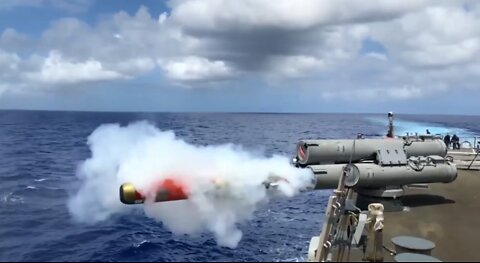 The destroyer USS Curtis Wilbur exercises a torpedo launch and fires an MK45 5 cannon