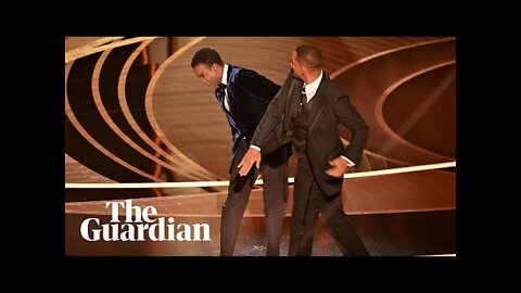 Watch the uncensored moment Will Smith smacks Chris Rock on stage at the Oscars, drops F-bomb