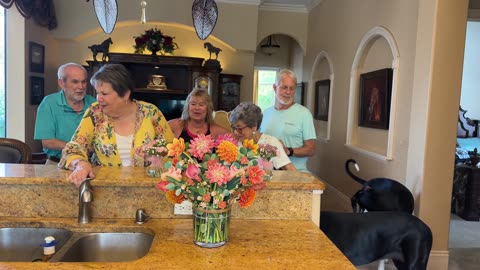 Great Dane adorably photo bombs Mother's day group video