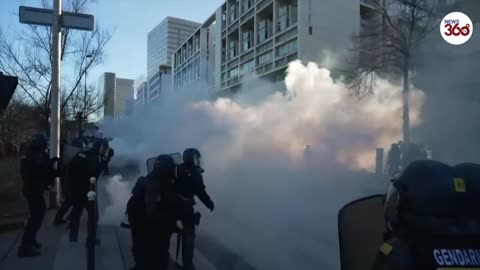 Police clash with 'Freedom Convoy' protesters in Paris