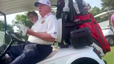 President Trump and Barron together on the course today.