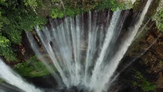 A calming landscape of a waterfall