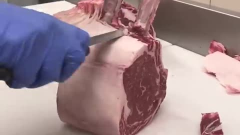 How do you French a bone-in prime rib roast at Alpine Butcher